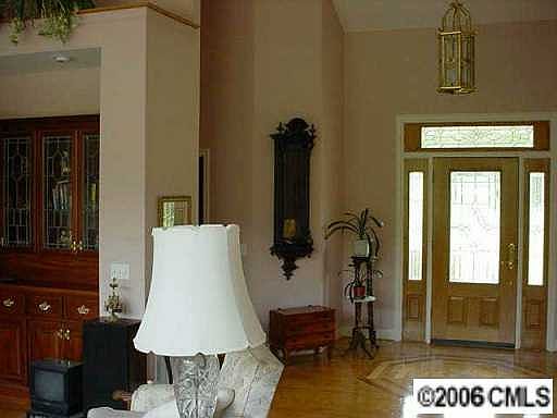 Foyer with cathedral ceiling