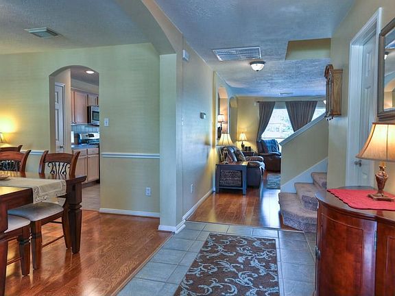 Welcome to 63 Shimmer Pond! Hardwood flooring in the formal dining and main living areas.