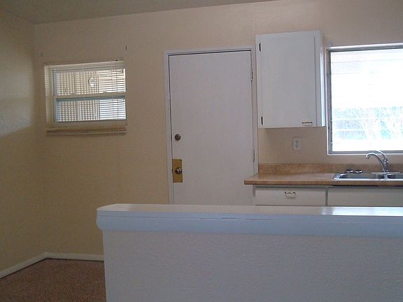 Standing in Living room looking at kitchen area