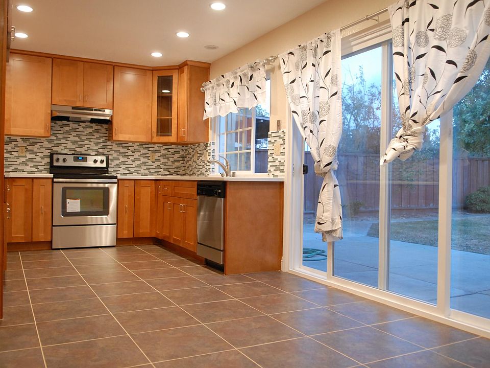 Kitchen and Nook with view to Large Back Yard