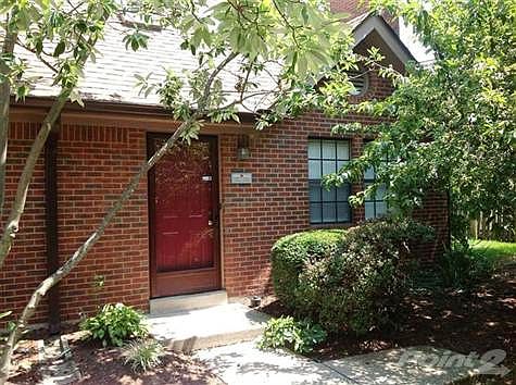 Surrounded by shade trees, the entrance to this end unit town home provides not only a private feel, but also a serene and welcoming visage as you return home.