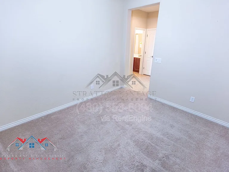 11751 W Daley Ln — Photo 26
