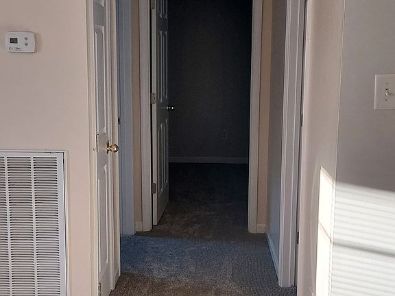 hall to two bedrooms and bathroom from living room