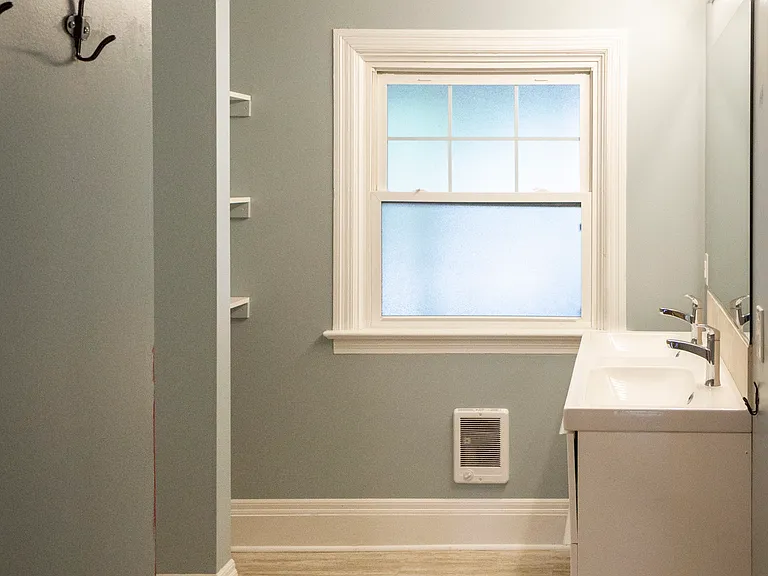bathroom with dual vanity
