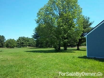 Former golf course in backyard
						:
						Acreage is aprx. 1/3 wooded, 2/3s meadow/greens