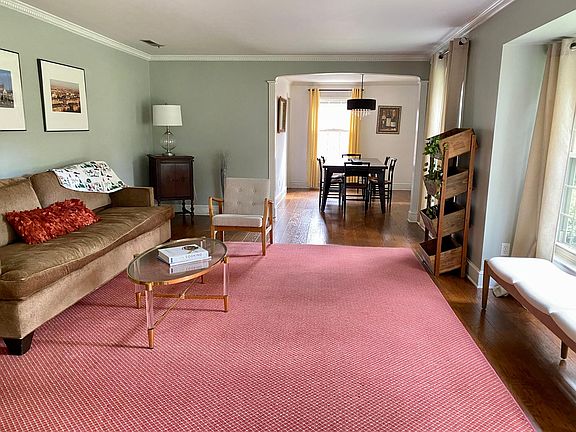 Spacious living room is open to the dining room.