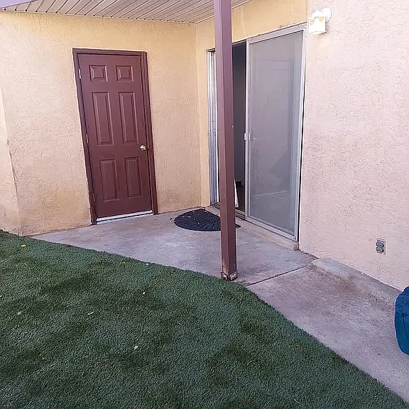 Private backyard with locked storage area