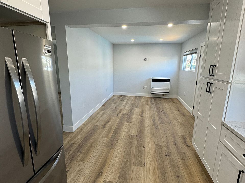 Kitchen looking into living room