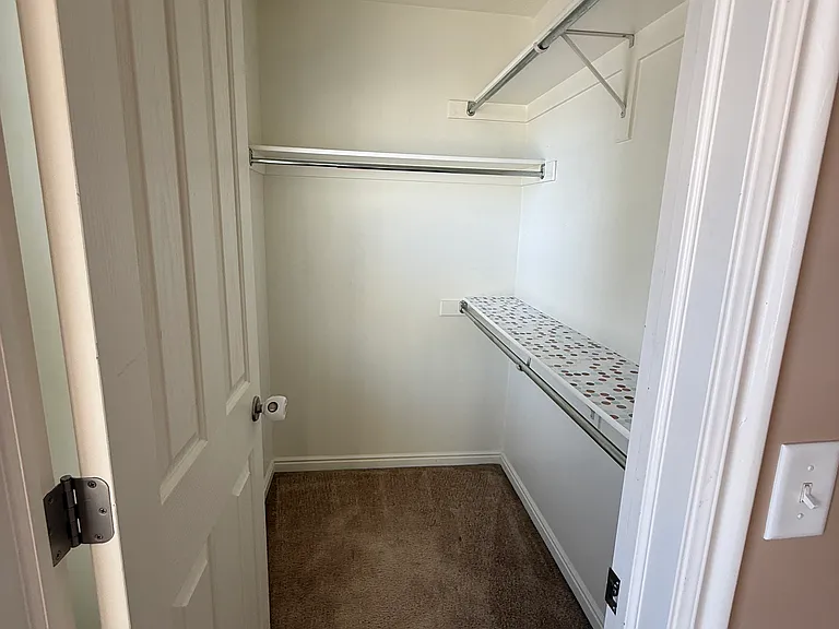 Upstairs 2nd Bedroom Walking Closet