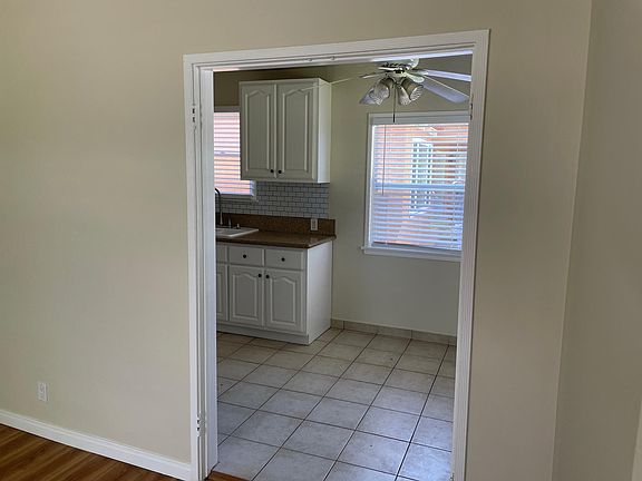 View of kitchen and dining area from living room