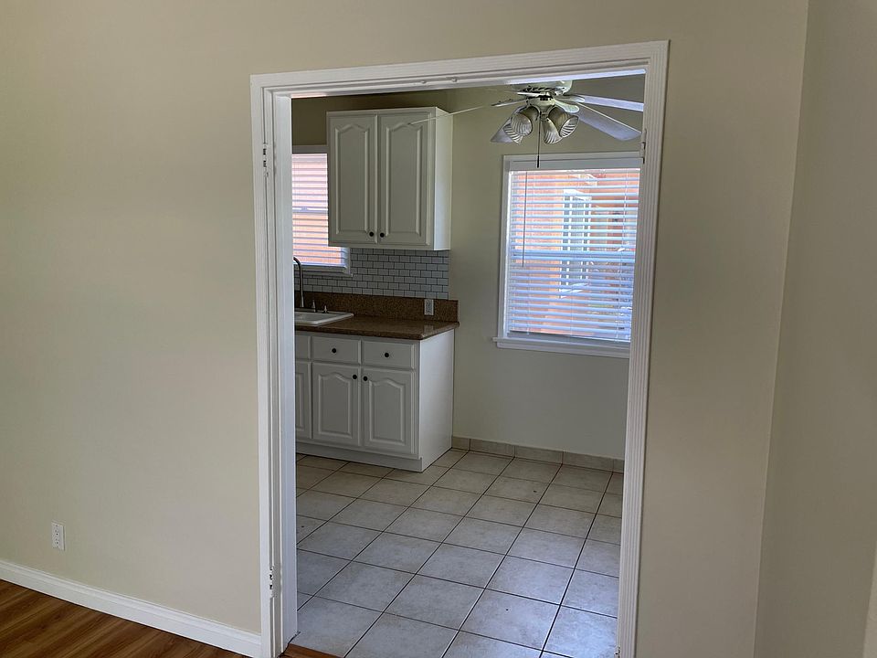 View of kitchen and dining area from living room