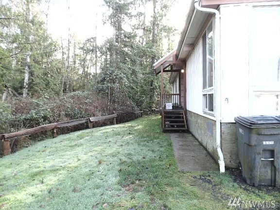Entrance with wooded view