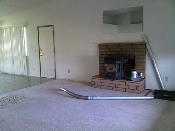 LIVING ROOM NOW HAS TILE FLOOR
FIRPLASE