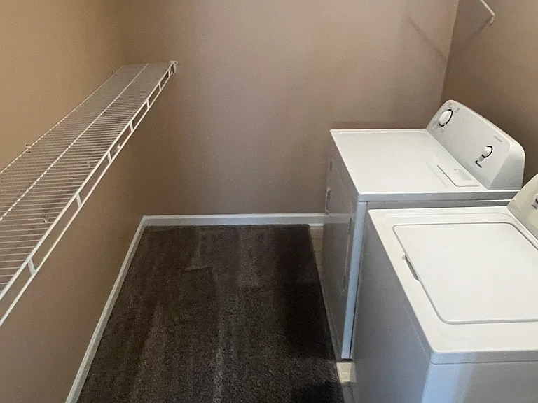 Walk in Closet in Main Bedroom with the Washer/Dryer for your convenience