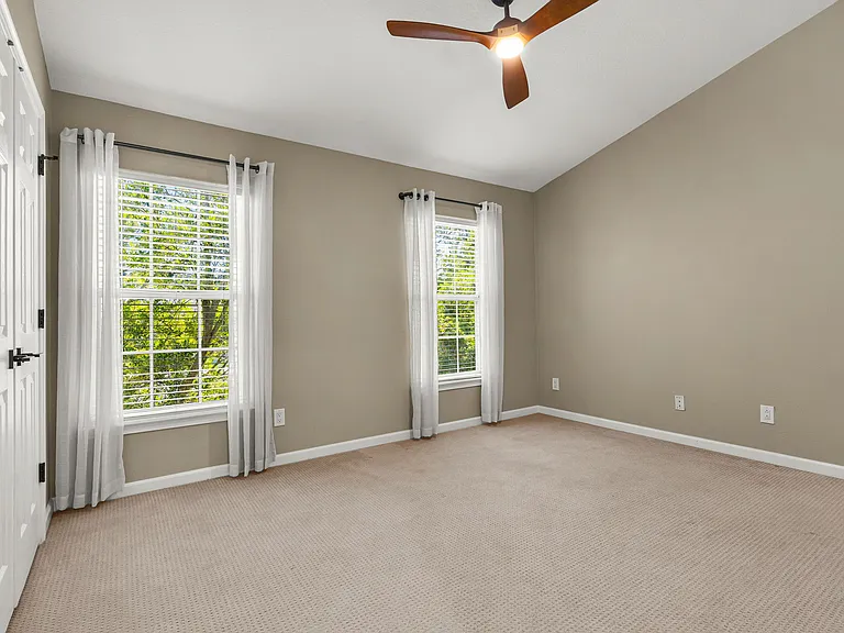 Second bedroom on third floor with large walk-in closet and en-suite bathroom