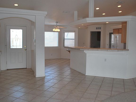 ENTRY, KITCHEN AND EATING AREA