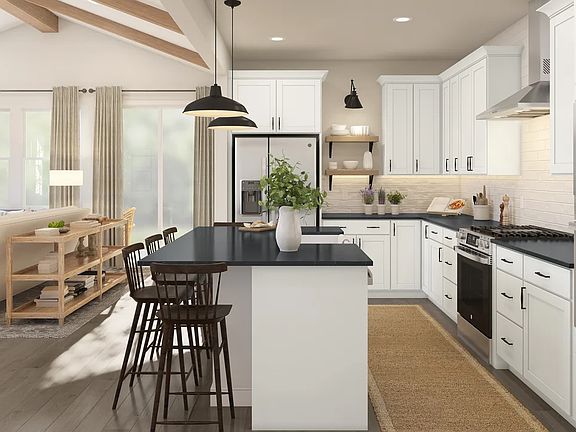 Kitchen with quartz island and countertops