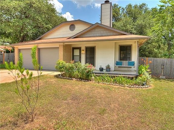 Front porch swing and brand new garage doors
