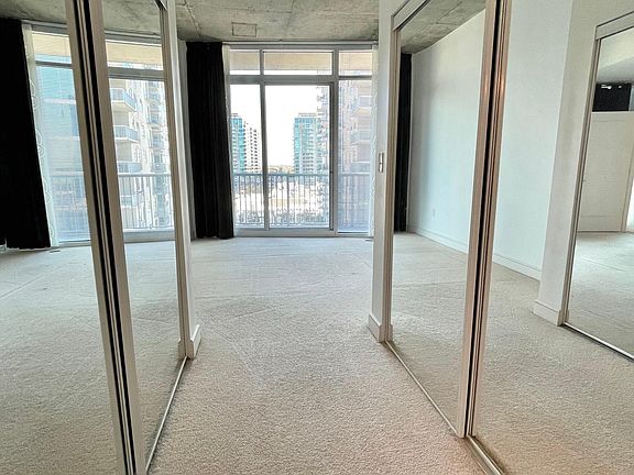 Ample Walk Through Closet Space with Two!