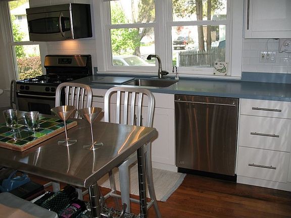 SS appliances and corian countertops