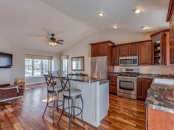 The center island is perfectly placed to cater to daily needs or entertaining. Lots of kitchen storage!