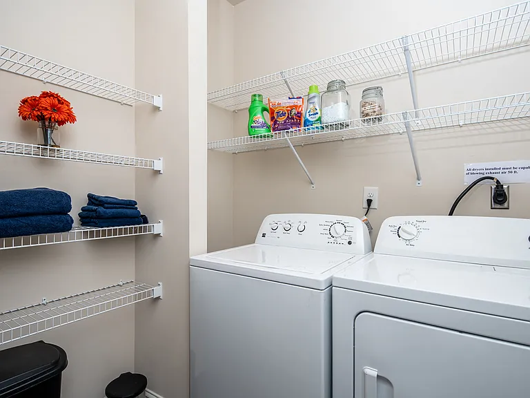 Laundry room with full-size washer and dryer