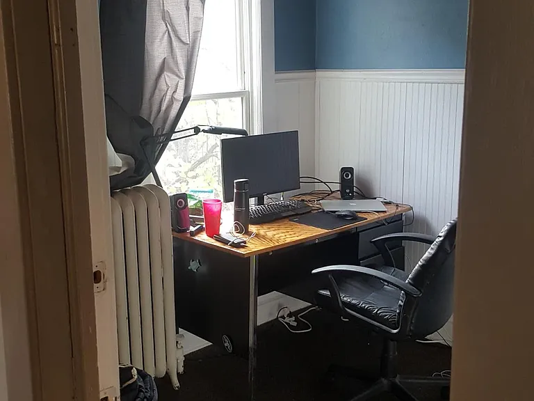 Main floor bedroom, currently used as office/study room