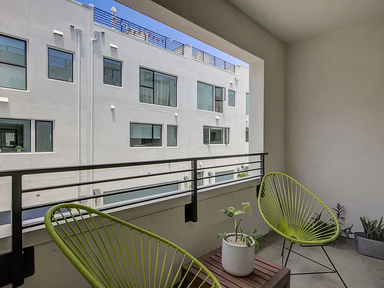 Private balcony (1 of 2), offering additional outdoor space and natural light.