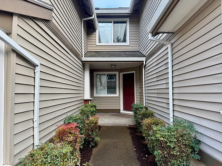 Entrance. Above front door is the smaller third bedroom.