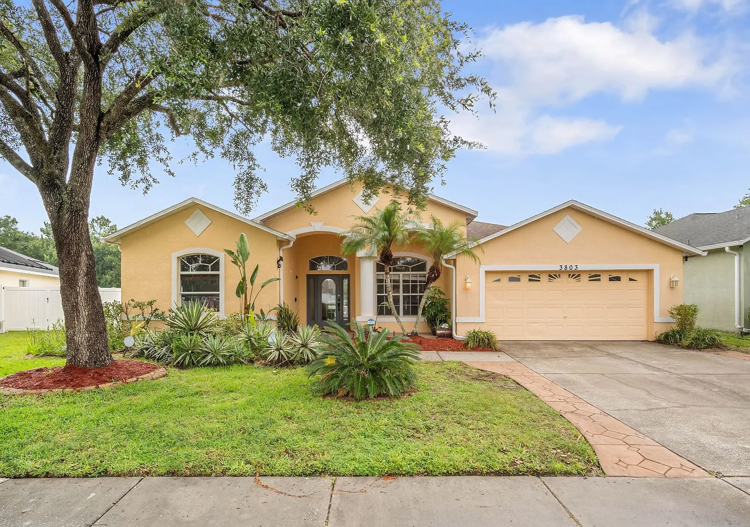 Spacious 4-bedroom, 3-bath pool home in the Highly Desirable Stagecoach Village Community of Land... — Photo 1