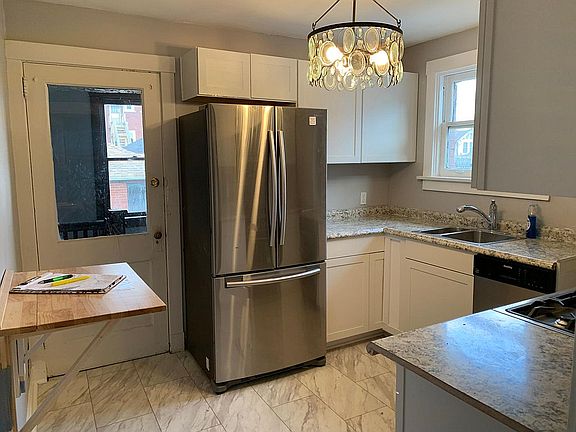 All new kitchen cabinets, appliances, even a drop-leaf counter/table for extra space.