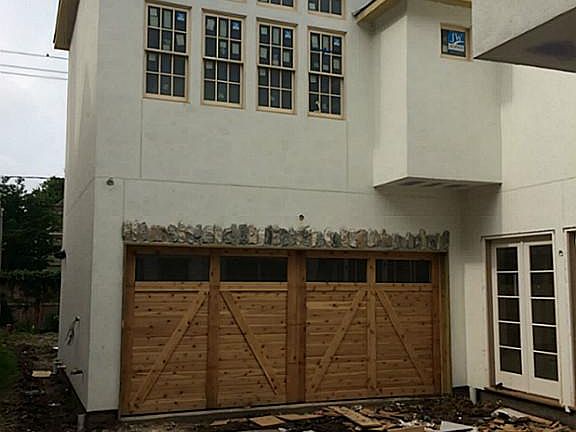 Two car garage set to the rear of property.