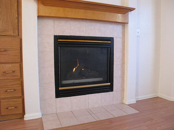 Enjoy warm gas fireplace