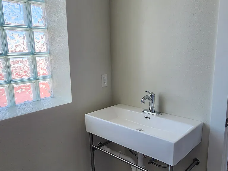 Bathroom Vanity. This photo was taken before the mirror put up, but it does have a mirror!