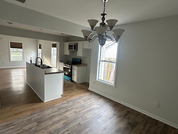 Kitchen/dining area, looking towards front door