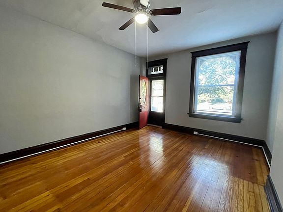 Large window in living room, 10' tall ceilings.