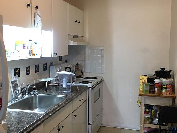 Kitchen area. LED lighting over sink. New dishwasher. Plenty cabinets.