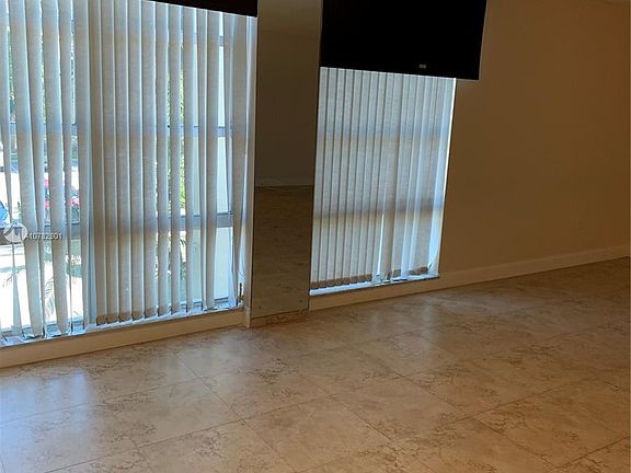 2nd image of 9800 W Bay Harbor Dr APT 206
