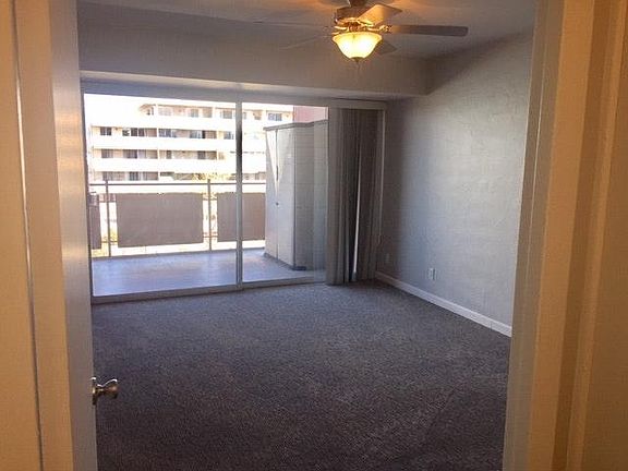 Large bedroom with full balcony
