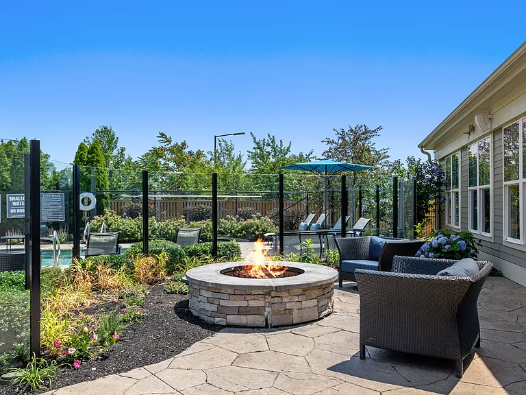 Gather around the outdoor firepit for cozy evenings and conversation