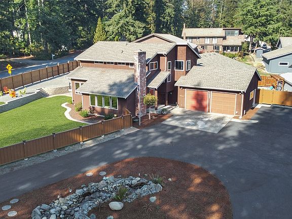 Beautiful corner lot with LOTS of space for playing, entertaining and storage, sprinkler system and electricity around entire fence for great lighting options>