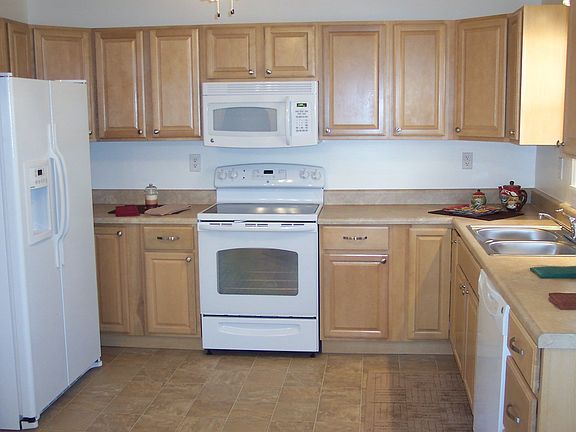 New appliances, maple cabinets, vinyl flooring