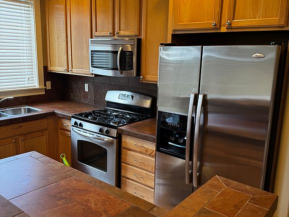 Tile countertops and backsplash.