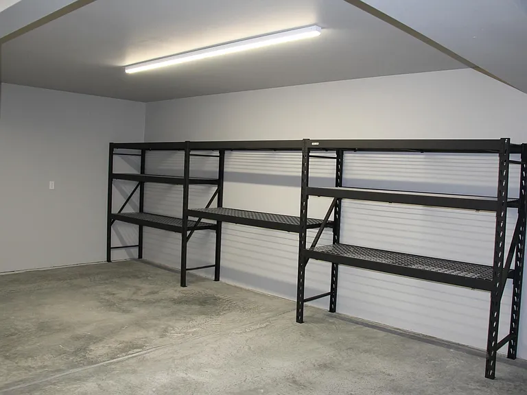 Garage with storage shelves included