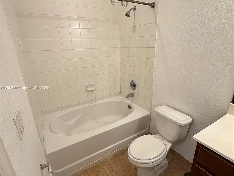 10870 NW 88th Ter #208 — Photo 27