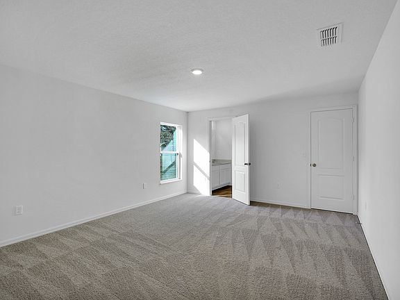 Massive master retreat features its own full bathroom