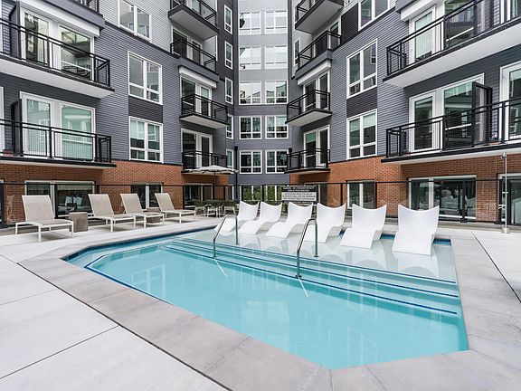 Relax in style on in-water loungers and soak up the calm atmosphere of this beautifully designed pool courtyard.
