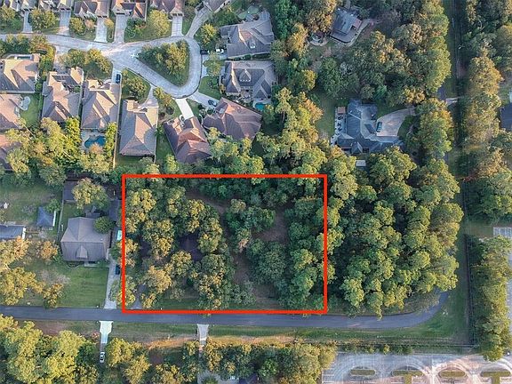 Lucious 1 acre property is on a cul-de-sac and is in The Heart of The Woodlands. Minutes from College Park Junior High and I-45.