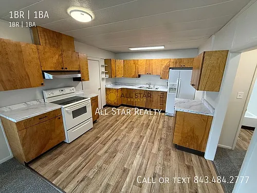 1100 W 32nd Ave #1 Photo 1