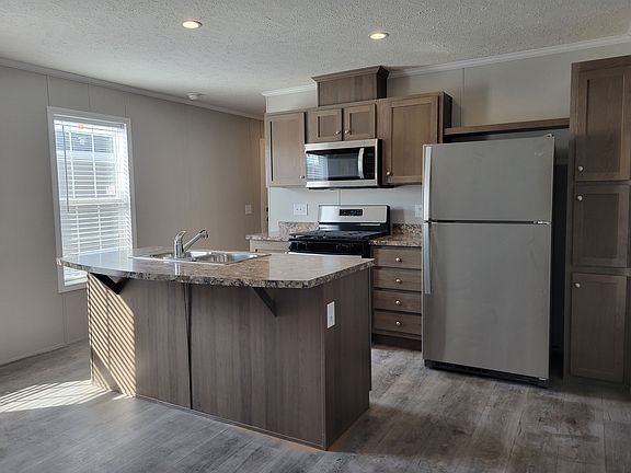 3rd image of 38000 Le Chateau Blvd #393